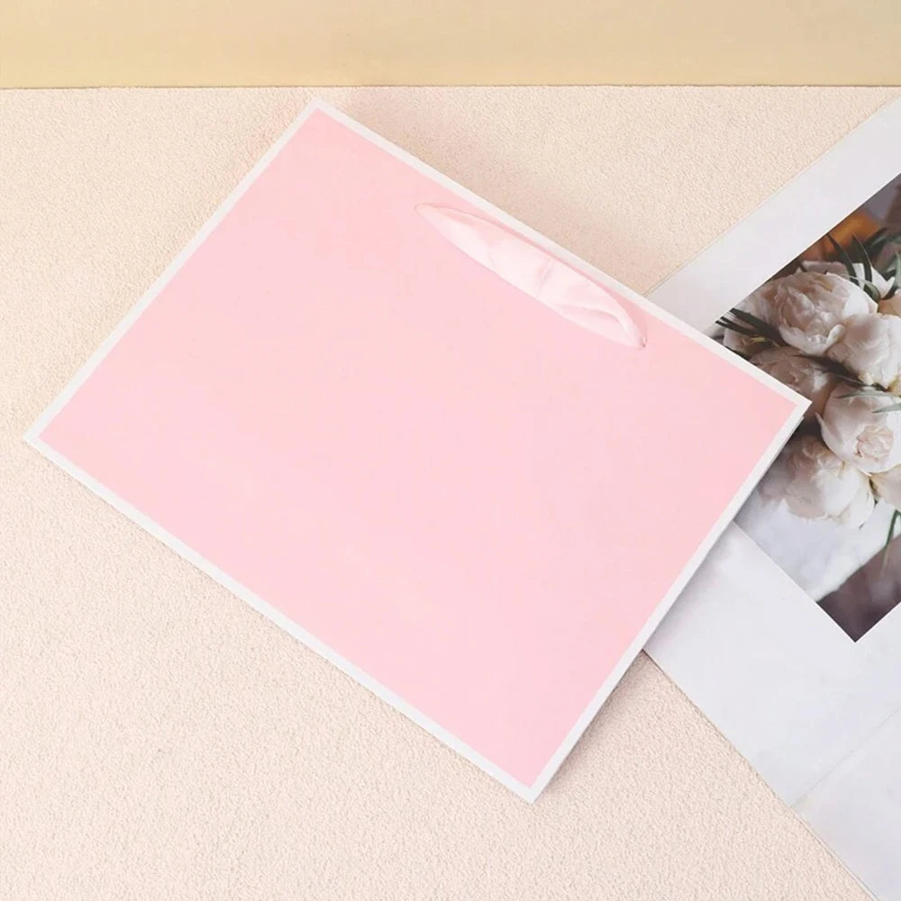 |ノベルティ用品 | リボンハンドル付きギフトバッグ | W27×H21×D8c