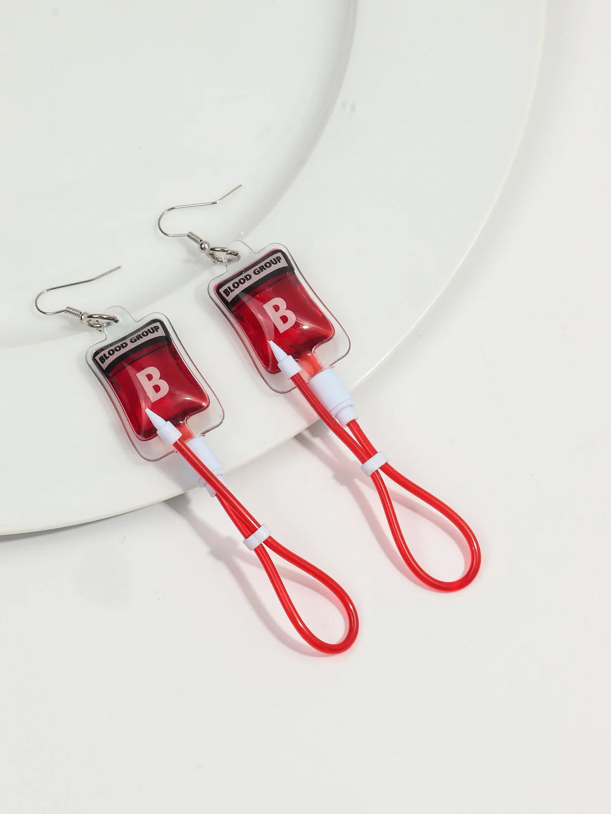 イベント・ハロウィングッズ|仮装用アクセサリー 血液バッグ型ピアス