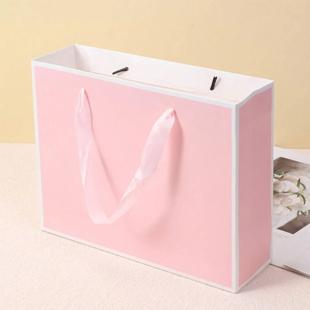 |ノベルティ用品 | リボンハンドル付きギフトバッグ | W27×H21×D8c