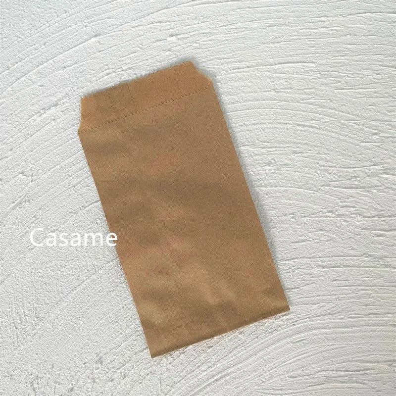 |ノベルティ用品 | ドット柄クラフトミニ紙袋 50枚入り | 8×15c