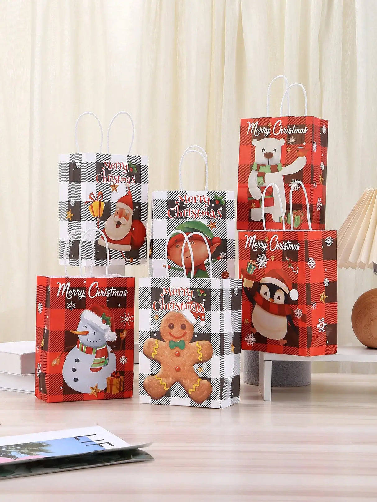 イベント・クリスマス装飾｜紙製サンタ＆雪だるま柄ギフトバッグ(1枚～24枚入)