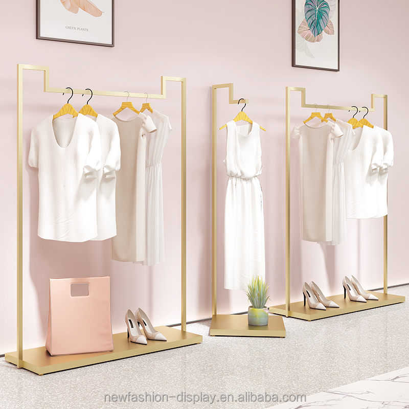 広州高級女性店衣料品店クロームステンレス鋼光沢のあるゴールドブティック家具ディスプレイラック服